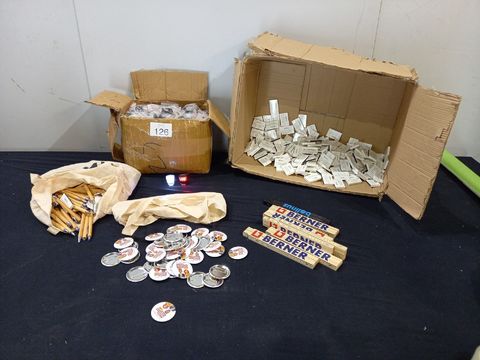 Lot of gadgets with meters,pens,matches and bicycle lights