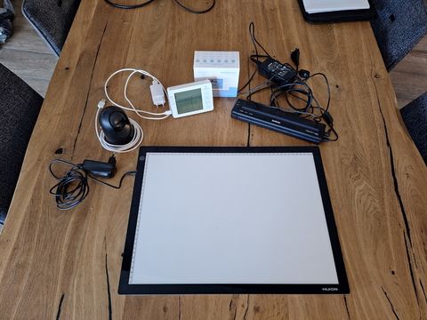 Huion lichtpad, Eufy Security indoor camera, Digitale CO₂-monitor en Compacte printer Brother