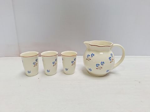 Keramiekset met kan en drie bekers