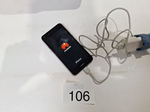 Huawei smartphone met lader