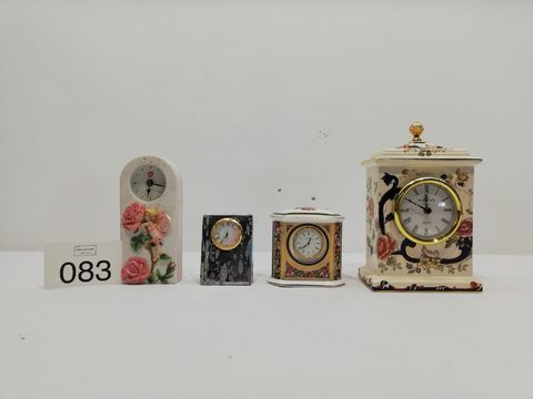 Gevarieerde collectie van vier decoratieve klokjes